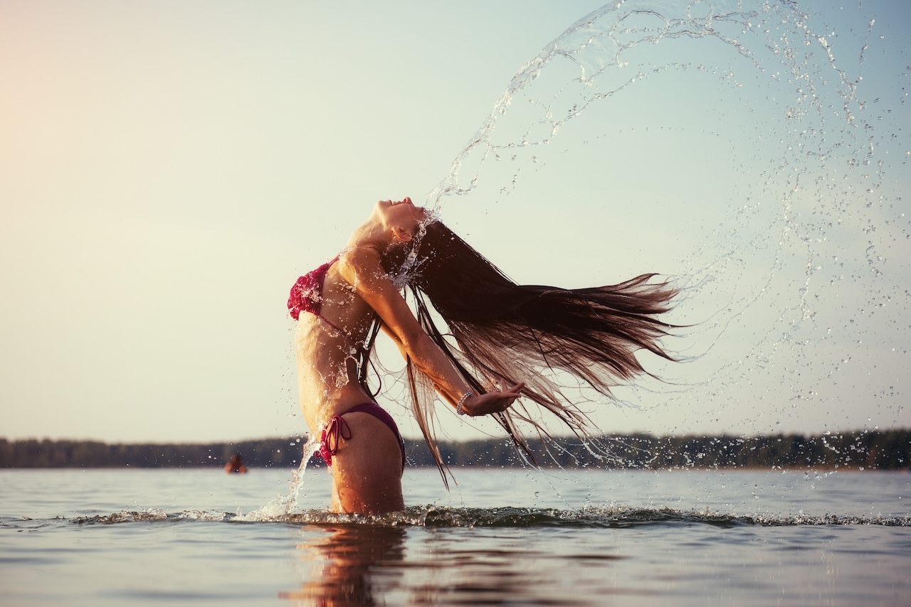 blonde woman on water background in Minnesota
